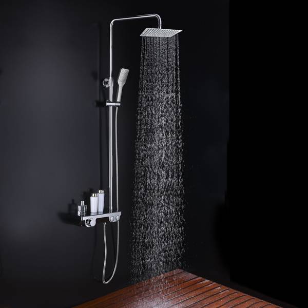 Columna de ducha ARTIC Quad con tubo redondo extensible de 82 a 126 cm. Grifo termostático y repisa integrada de cristal templado
